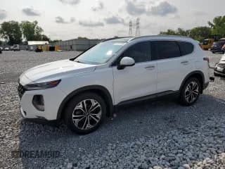 ✅ 2020 Hyundai Santa Fe Limited • VIN: 5NMS5CAA9LH227114 • Lot: 64599194. Wystawiony na Copart z przebiegiem 63 994 mil. Bezpłatny archiwum sprzedaży aukcyjnych z USA i szczegółowy raport historii pojazdu na DreamBid. Zdjęcie 1.