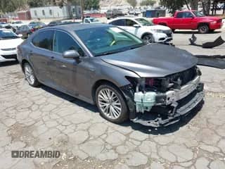 2020 Toyota Camry Hybrid XLE z VIN 4T1F31AK0LU527228, wystawiony jako IAAI lot #42532828 z przebiegiem 99 749 mil mil oraz . Historia ofert i sprzedaży dostępna na DreamBid. Obrazek 1.