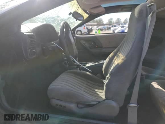 1997 Chevrolet Camaro z VIN 2G1FP22K6V2114714, wystawiony jako Copart lot #42320245 z przebiegiem 239 087 mil mil oraz Szkoda całkowita • Salvage title. Historia ofert i sprzedaży dostępna na DreamBid. Obrazek 7.