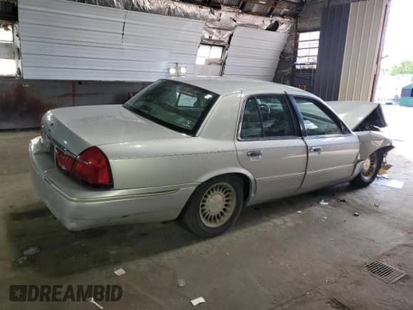 ✅ 2001 Mercury Grand Marquis LS • VIN: 2MEFM75W81X603977 • Лот: 64108865. Опубликован ранее на Copart с пробегом 187 153 миль. Бесплатный доступ к архиву аукционных продаж из США и подробный отчёт об истории автомобиля на DreamBid. Изображение 3.