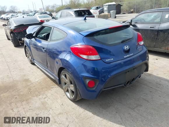 2015 Hyundai Veloster Turbo R-Spec z VIN KMHTC6AE1FU241628, wystawiony jako IAAI lot #42013008 z przebiegiem 110 357 mil mil oraz . Historia ofert i sprzedaży dostępna na DreamBid. Obrazek 3.
