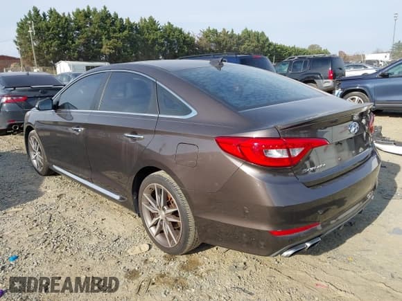 ✅ 2015 Hyundai Sonata Sport • VIN: 5NPE34AB6FH084163 • Lot: 43640225. Listed on IAAI with 234,665 mi. Free auction sales archive from the USA and detailed vehicle history report at DreamBid. Image 3.
