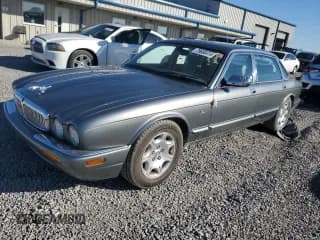 ✅ 2002 Jaguar XJ Vanden Plas • VIN: SAJDA24C62LF48556 • Лот: 79600414. Опубликован ранее на Copart с пробегом 159 081 миль. Бесплатный доступ к архиву аукционных продаж из США и подробный отчёт об истории автомобиля на DreamBid. Изображение 1.