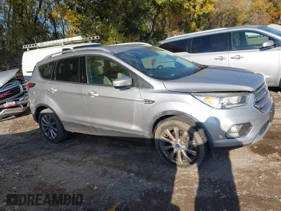 2017 Ford Escape Titanium с VIN 1FMCU9J99HUA63066, выставлен на аукционе IAAI как лот 43605469 с пробегом 74 186 миль миль и . История ставок и продаж доступна на DreamBid. Изображение 13.