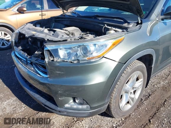 ✅ 2015 Toyota Highlander Limited Platinum • VIN: 5TDDKRFH0FS084873 • Lot: 43776554. Listed on IAAI with 100,105 mi. Free auction sales archive from the USA and detailed vehicle history report at DreamBid. Image 6.