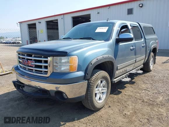 2007 GMC Sierra 1500 SLE1 with VIN 2GTEK13M571539815, listed as a IAAI auction lot 43098243 with Not provided miles and . Bid and sale history available at DreamBid. Image 2.