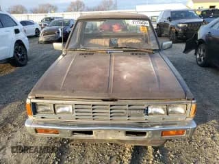 ✅ 1986 Nissan Navara • VIN: JN6ND01S0GW108990 • Lot: 87115634. Wystawiony na Copart z przebiegiem 364 953 mil. Bezpłatny archiwum sprzedaży aukcyjnych z USA i szczegółowy raport historii pojazdu na DreamBid. Zdjęcie 5.