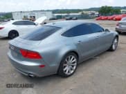 ✅ 2013 Audi A7 Premium Plus • VIN: WAUYGAFCXDN040582 • Лот: 42634757. Опубликован ранее на IAAI с пробегом 165 356 миль. Бесплатный доступ к архиву аукционных продаж из США и подробный отчёт об истории автомобиля на DreamBid. Изображение 4.