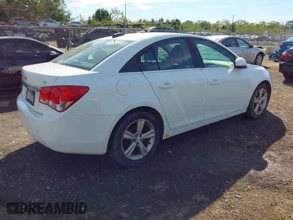 ✅ 2015 Chevrolet Cruze LT • VIN: 1G1PE5SB5F7258227 • Lot: 43460827. Listed on IAAI with 128,271 mi. Free auction sales archive from the USA and detailed vehicle history report at DreamBid. Image 4.