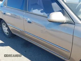 ✅ 2003 Kia Spectra • VIN: KNAFB121835256469 • Лот: 43685341. Опубликован ранее на IAAI с пробегом 110 551 миль. Бесплатный доступ к архиву аукционных продаж из США и подробный отчёт об истории автомобиля на DreamBid. Изображение 6.