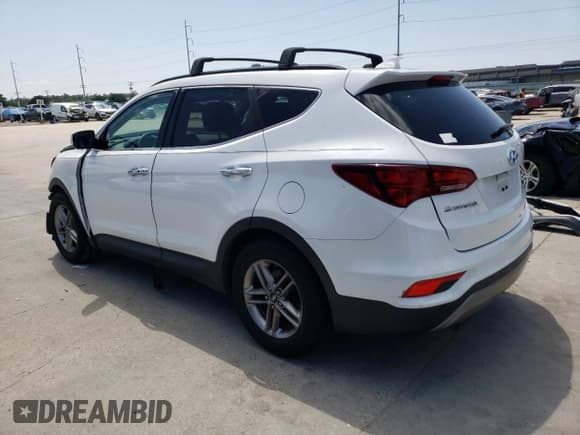 ✅ 2017 Hyundai Santa Fe 2.4L • VIN: 5XYZU3LB4HG401907 • Лот: 57859824. Опубликован ранее на Copart с пробегом 112 855 миль. Бесплатный доступ к архиву аукционных продаж из США и подробный отчёт об истории автомобиля на DreamBid. Изображение 2.