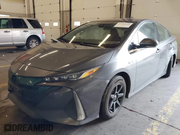 ✅ 2017 Toyota Prius Advanced • VIN: JTDKARFP7H3003423 • Лот: 43589206. Опубликован ранее на IAAI с пробегом 133 729 миль. Бесплатный доступ к архиву аукционных продаж из США и подробный отчёт об истории автомобиля на DreamBid. Изображение 2.