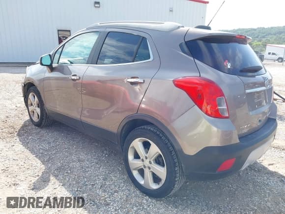 ✅ 2015 Buick Encore Leather • VIN: KL4CJCSB4FB121633 • Lot: 42739417. Listed on IAAI with 80,998 mi. Free auction sales archive from the USA and detailed vehicle history report at DreamBid. Image 3.