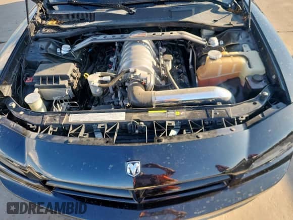 2006 Dodge Charger SRT-8 с VIN 2B3KA73W96H288105, выставлен на аукционе Copart как лот 84009015 с пробегом 83 880 миль миль и Списание • Salvage title. История ставок и продаж доступна на DreamBid. Изображение 11.