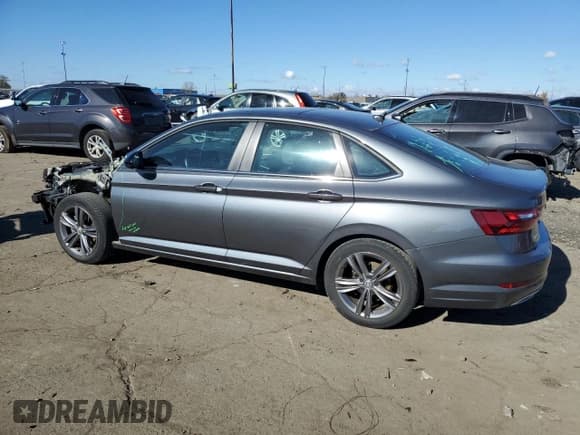 ✅ 2021 Volkswagen Jetta S • VIN: 3VWC57BU4MM065506 • Lot: 87289895. Wystawiony na Copart z przebiegiem 28 983 mil. Bezpłatny archiwum sprzedaży aukcyjnych z USA i szczegółowy raport historii pojazdu na DreamBid. Zdjęcie 2.