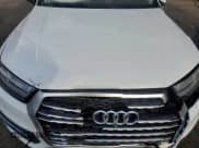 ✅ 2018 Audi Q7 Prestige • VIN: WA1VAAF70JD003448 • Лот: 91898925. Опубликован ранее на Copart с пробегом 76 778 миль. Бесплатный доступ к архиву аукционных продаж из США и подробный отчёт об истории автомобиля на DreamBid. Изображение 12.