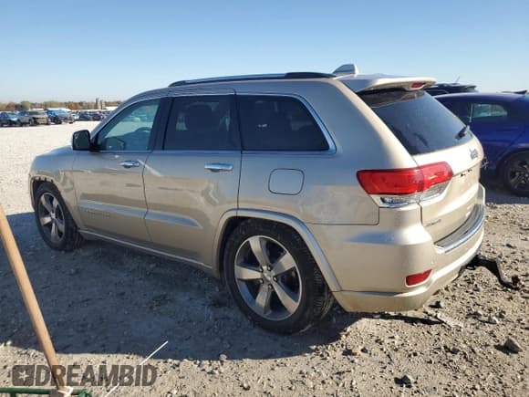 ✅ 2014 Jeep Grand Cherokee Overland • VIN: 1C4RJFCT9EC147999 • Lot: 89689645. Listed on Copart with 133,640 mi. Free auction sales archive from the USA and detailed vehicle history report at DreamBid. Image 2.
