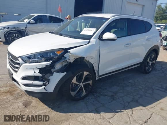 ✅ 2017 Hyundai Tucson Sport • VIN: KM8J33A22HU506975 • Lot: 43233313. Listed on IAAI with 61,552 mi. Free auction sales archive from the USA and detailed vehicle history report at DreamBid. Image 2.