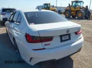 ✅ 2022 BMW 3 Series 330i • VIN: 3MW5R1J06N8C42821 • Lot: 42234878. Listed on IAAI with 60,888 mi. Free auction sales archive from the USA and detailed vehicle history report at DreamBid. Image 3.