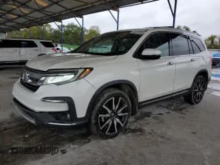 ✅ 2019 Honda Pilot Touring 8-Passenger • VIN: 5FNYF5H98KB033740 • Lot: 90401525. Listed on Copart with 91,251 mi. Free auction sales archive from the USA and detailed vehicle history report at DreamBid. Image 1.