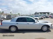 ✅ 2001 Ford Crown Victoria • VIN: 2FAFP73W31X139188 • Lot: 41883697. Listed on IAAI with 142,744 mi. Free auction sales archive from the USA and detailed vehicle history report at DreamBid. Image 14.