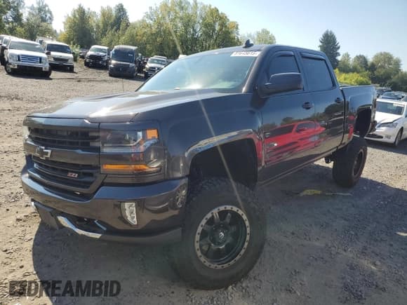 ✅ 2016 Chevrolet Silverado 1500 LT • VIN: 3GCUKREC2GG104756 • Лот: 81645615. Опубликован ранее на Copart с пробегом 76 799 миль. Бесплатный доступ к архиву аукционных продаж из США и подробный отчёт об истории автомобиля на DreamBid. Изображение 1.