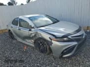 ✅ 2022 Toyota Camry Hybrid Nightshade • VIN: 4T1T31AK4NU045402 • Lot: 92424775. Listed on Copart with 56,918 mi. Free auction sales archive from the USA and detailed vehicle history report at DreamBid. Image 4.