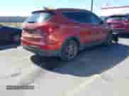 2018 Hyundai Santa Fe 2.4L z VIN 5XYZU3LB8JG523000, wystawiony jako IAAI lot #43263685 z przebiegiem 96 480 mil mil oraz . Historia ofert i sprzedaży dostępna na DreamBid. Obrazek 4.