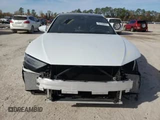 ✅ 2020 Audi A8 • VIN: WAU8DAF81LN015654 • Лот: 79126853. Опубликован ранее на Copart с пробегом 26 587 миль. Бесплатный доступ к архиву аукционных продаж из США и подробный отчёт об истории автомобиля на DreamBid. Изображение 5.