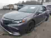 2022 Toyota Camry XSE with VIN 4T1K61BK0NU062277, listed as a IAAI auction lot 41083917 with 33,571 mi miles and . Bid and sale history available at DreamBid. Image 2.