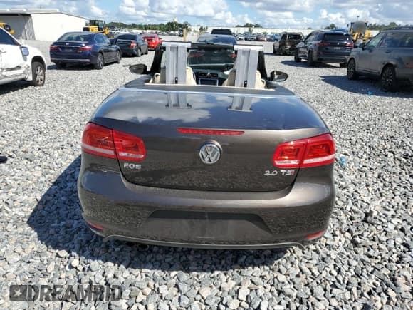✅ 2013 Volkswagen Eos Sport • VIN: WVWBW8AH6DV004170 • Лот: 86692455. Опубликован ранее на Copart с пробегом 52 592 миль. Бесплатный доступ к архиву аукционных продаж из США и подробный отчёт об истории автомобиля на DreamBid. Изображение 6.