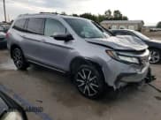 ✅ 2022 Honda Pilot Touring 7-Passenger • VIN: 5FNYF6H61NB019565 • Lot: 61307035. Listed on Copart with 75,932 mi. Free auction sales archive from the USA and detailed vehicle history report at DreamBid. Image 4.