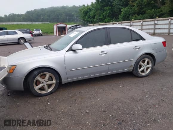 ✅ 2007 Hyundai Sonata SE • VIN: 5NPEU46F77H209567 • Лот: 42356544. Опубликован ранее на IAAI с пробегом 163 248 миль. Бесплатный доступ к архиву аукционных продаж из США и подробный отчёт об истории автомобиля на DreamBid. Изображение 2.