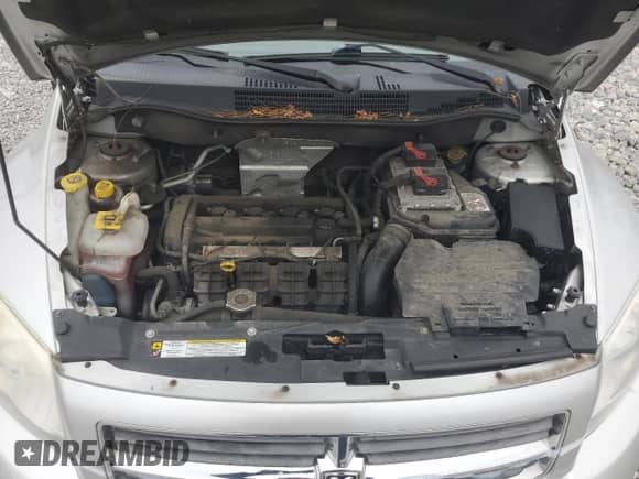 2011 Dodge Caliber Mainstreet с VIN 1B3CB3HA4BD297339, выставлен на аукционе Copart как лот 79212834 с пробегом 114 328 миль миль и Чистый • Clean title. История ставок и продаж доступна на DreamBid. Изображение 11.