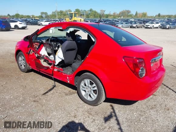 ✅ 2014 Chevrolet Sonic LT • VIN: 1G1JC5SB3E4243298 • Lot: 43349669. Listed on IAAI with 151,831 mi. Free auction sales archive from the USA and detailed vehicle history report at DreamBid. Image 3.