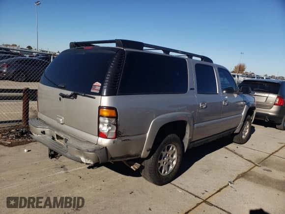 2005 Chevrolet Suburban LS с VIN 3GNFK16Z55G268911, выставлен на аукционе Copart как лот 82489564 с пробегом 185 020 миль миль и Списание • Salvage title. История ставок и продаж доступна на DreamBid. Изображение 3.