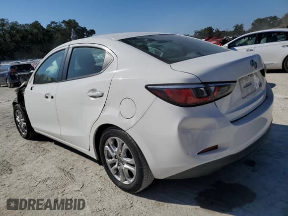 ✅ 2016 Scion iA • VIN: 3MYDLBZV7GY133214 • Lot: 93189965. Wystawiony na Copart z przebiegiem 78 800 mil. Bezpłatny archiwum sprzedaży aukcyjnych z USA i szczegółowy raport historii pojazdu na DreamBid. Zdjęcie 2.