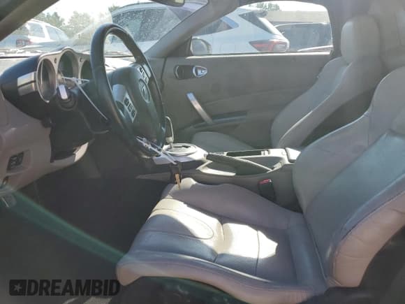 ✅ 2007 Nissan 350Z Touring • VIN: JN1BZ36A07M652297 • Lot: 69073074. Wystawiony na Copart z przebiegiem 112 136 mil. Bezpłatny archiwum sprzedaży aukcyjnych z USA i szczegółowy raport historii pojazdu na DreamBid. Zdjęcie 7.