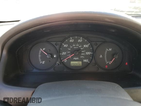 ✅ 2000 Mazda Protege DX • VIN: JM1BJ2220Y0239835 • Lot: 80228864. Wystawiony na Copart z przebiegiem 200 936 mil. Bezpłatny archiwum sprzedaży aukcyjnych z USA i szczegółowy raport historii pojazdu na DreamBid. Zdjęcie 9.