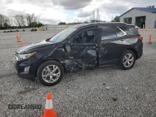 2020 Chevrolet Equinox Premier с VIN 2GNAXNEV4L6152643, выставлен на аукционе Copart как лот 82103365 с пробегом 64 405 миль миль и Списание • Salvage title. История ставок и продаж доступна на DreamBid. Изображение 1.