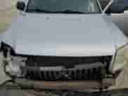 2011 Mercury Mariner z VIN 4M2CN8B73BKJ06886, wystawiony jako Copart lot #50308485 z przebiegiem 118 584 mil mil oraz Szkoda całkowita • Salvage title. Historia ofert i sprzedaży dostępna na DreamBid. Obrazek 13.