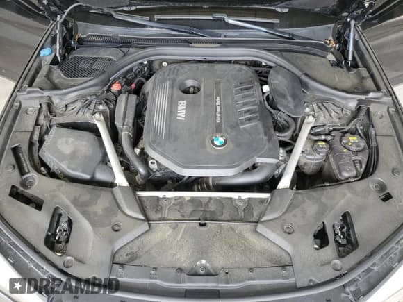 ✅ 2018 BMW 5 Series 540i xDrive • VIN: WBAJE7C5XJWC57056 • Лот: 82409125. Опубликован ранее на Copart с пробегом 82 462 миль. Бесплатный доступ к архиву аукционных продаж из США и подробный отчёт об истории автомобиля на DreamBid. Изображение 11.