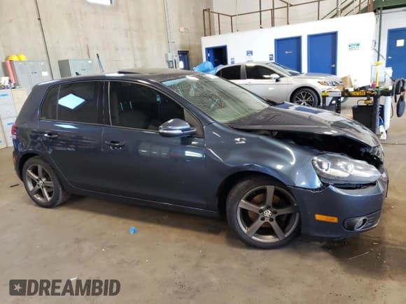 ✅ 2012 Volkswagen Golf TDI • VIN: WVWNM7AJ6CW289588 • Lot: 69832644. Listed on Copart with 193,058 mi. Free auction sales archive from the USA and detailed vehicle history report at DreamBid. Image 4.