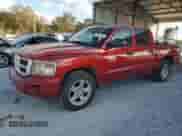 2010 Dodge Dakota SXT with VIN 1D7CW3GP0AS107674, listed as a Copart auction lot 79161534 with 181,681 mi miles and Salvage title. Bid and sale history available at DreamBid. Image 1.