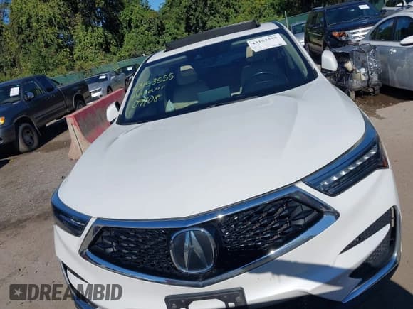 ✅ 2021 Acura RDX • VIN: 5J8TC2H32ML017256 • Lot: 43153555. Listed on IAAI with 61,756 mi. Free auction sales archive from the USA and detailed vehicle history report at DreamBid. Image 12.