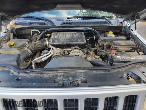 ✅ 2006 Jeep Commander • VIN: 1J8HH48NX6C269125 • Lot: 84370915. Listed on Copart with 144,143 mi. Free auction sales archive from the USA and detailed vehicle history report at DreamBid. Image 7.