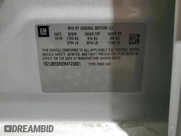 2017 Chevrolet Sonic LS с VIN 1G1JB5SH2H4123651, выставлен на аукционе Copart как лот 82694485 с пробегом Не указан миль и Списание • Salvage title. История ставок и продаж доступна на DreamBid. Изображение 13.