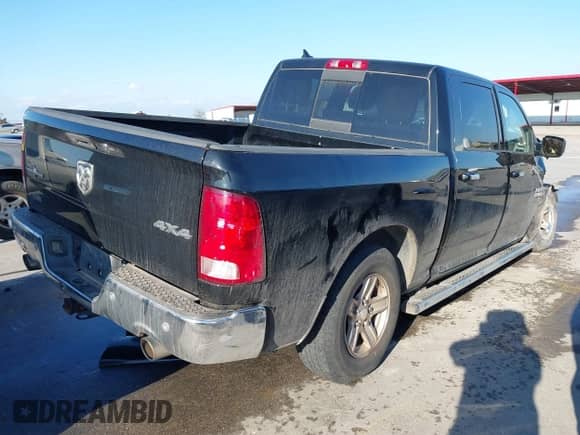 2014 Ram 1500 Big Horn with VIN 1C6RR7LT0ES463013, listed as a IAAI auction lot 41500663 with 164,285 mi miles and . Bid and sale history available at DreamBid. Image 4.