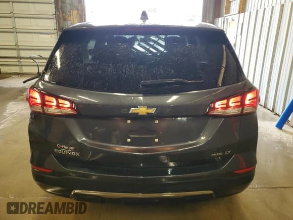 ✅ 2022 Chevrolet Equinox LT • VIN: 2GNAXUEV5N6128848 • Lot: 86069975. Wystawiony na Copart z przebiegiem 67 722 mil. Bezpłatny archiwum sprzedaży aukcyjnych z USA i szczegółowy raport historii pojazdu na DreamBid. Zdjęcie 6.