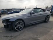 ✅ 2012 BMW 6 Series 650i • VIN: WBALZ3C57CDL71694 • Lot: 64867045. Listed on Copart with 118,323 mi. Free auction sales archive from the USA and detailed vehicle history report at DreamBid. Image 1.